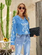 Women’s ethnic print V-neck long sleeve casual top shirt by Bella Mia, featuring vibrant patterns and comfortable fit.