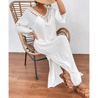 Colorful hand-crocheted women’s beach overskirt with cutout back, loose fit, and hollow design by Bella Mia.