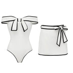 Black and white swimsuit for women with a sweet girl bow and matching skirt, featuring color-coordinated design by Plush Fashion Hub.