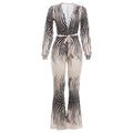 Deep V plunge off-shoulder top paired with high waist bootcut pants jumpsuit by Plush Fashion Hub, stylish and elegant for fashion-forward looks.