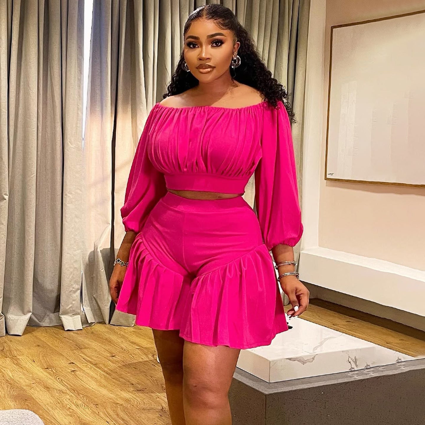 Plus size women's casual pleated two-piece set with off-shoulder neckline and fluffy waist trimming by Plush Fashion Hub