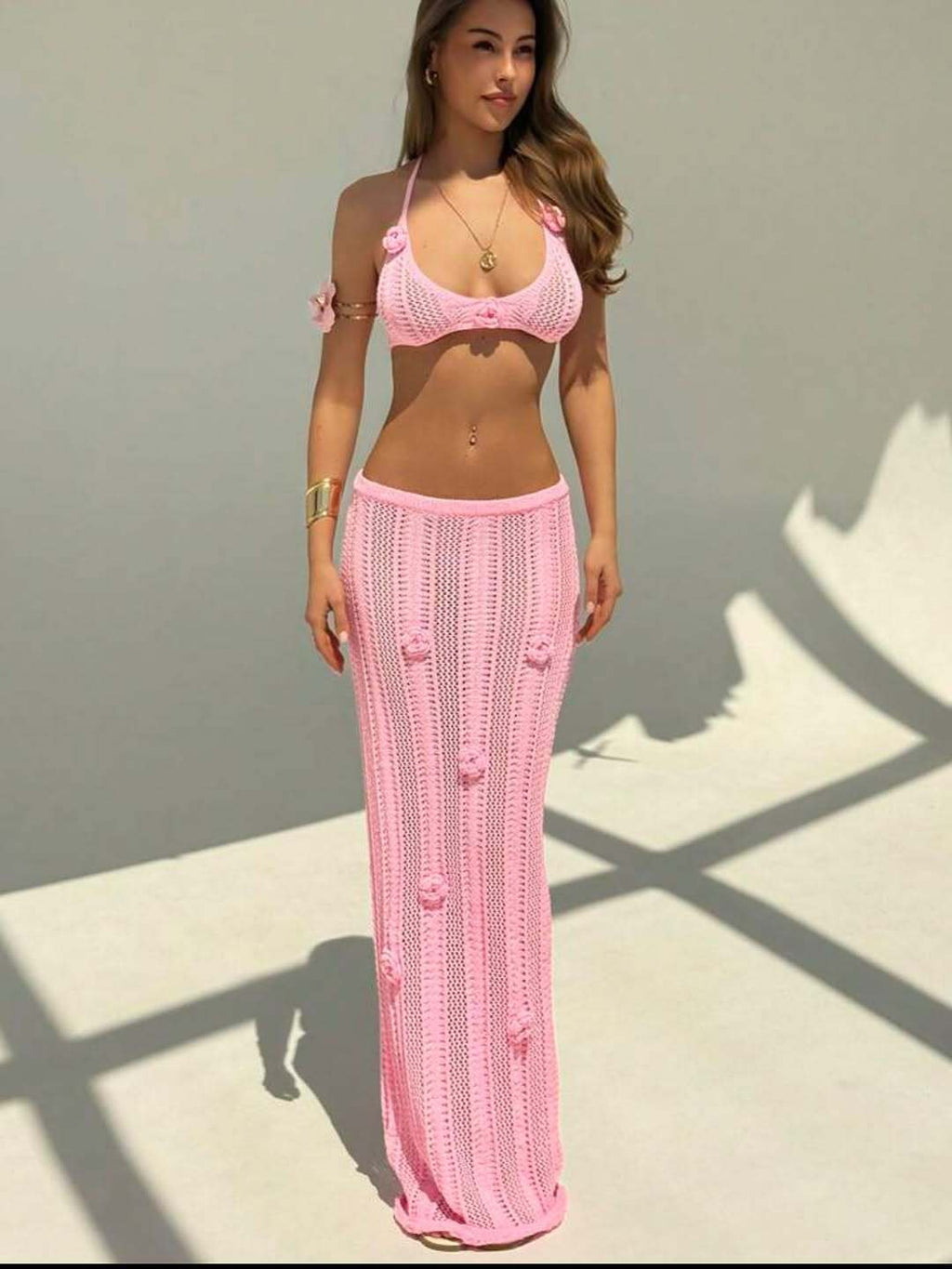 Floral knitted bikini swimsuit with halter straps, cropped design, and floating floral pattern, by Plush Fashion Hub.