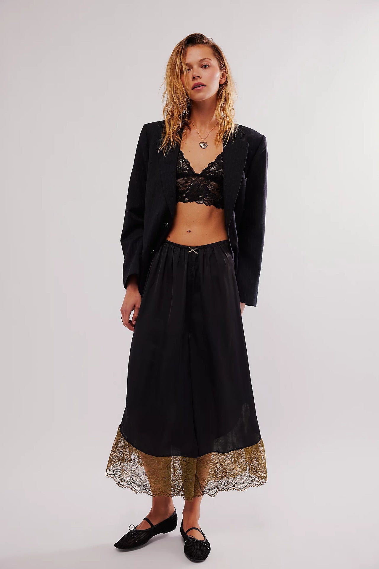 Women’s loose wide-leg satin trousers with lace stitching, casual office wear from Plush Fashion Hub, shown in soft fabric detail.