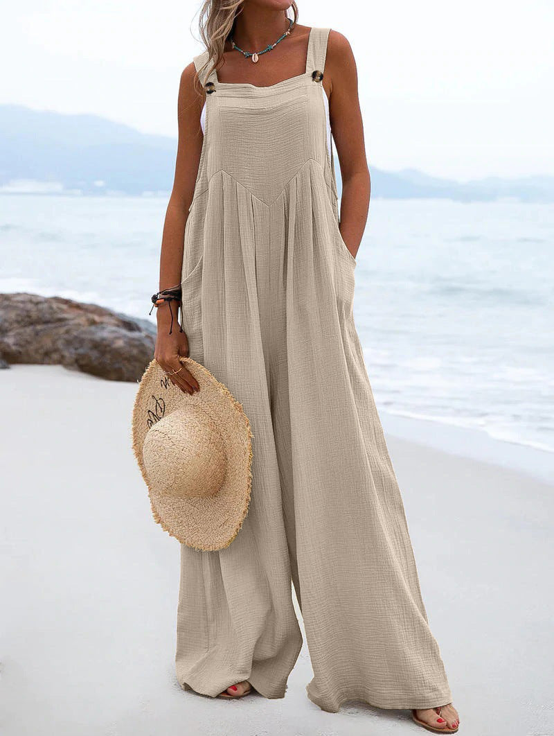 Women’s summer jumpsuit by Bella Mia featuring ethnic solid color, wide-leg design and relaxed fit, perfect for warm weather.