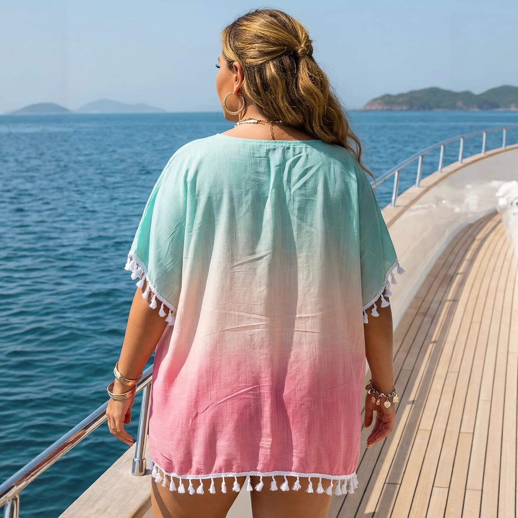Women’s casual loose T-shirt with gradient print and tassel stitching, perfect as a beach cover-up by Plush Fashion Hub.