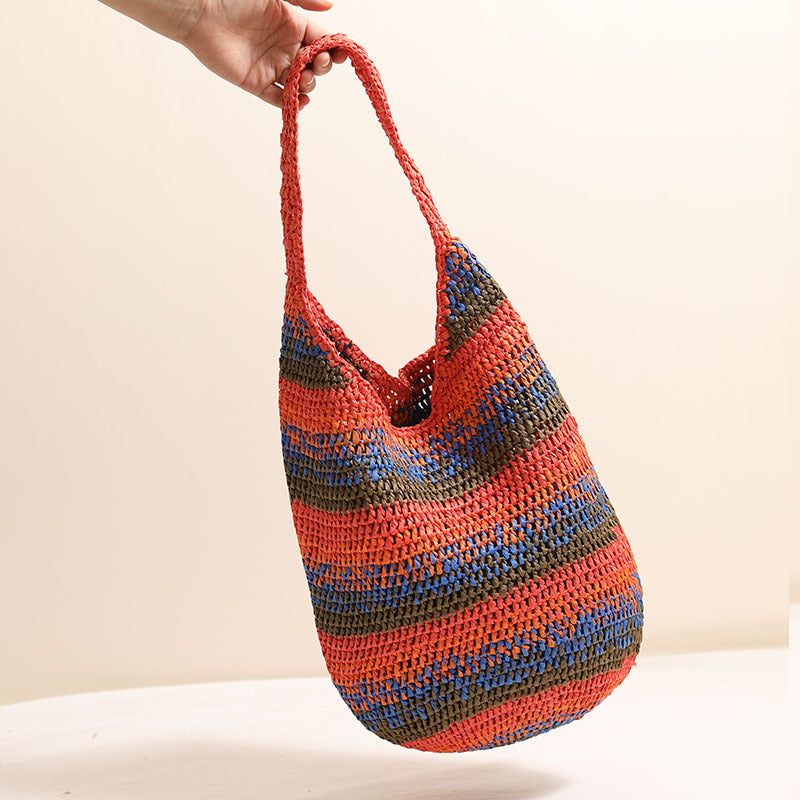 Large woven straw shoulder bag with casual design, perfect for seaside vacations and beach outings, by Wanita Store.