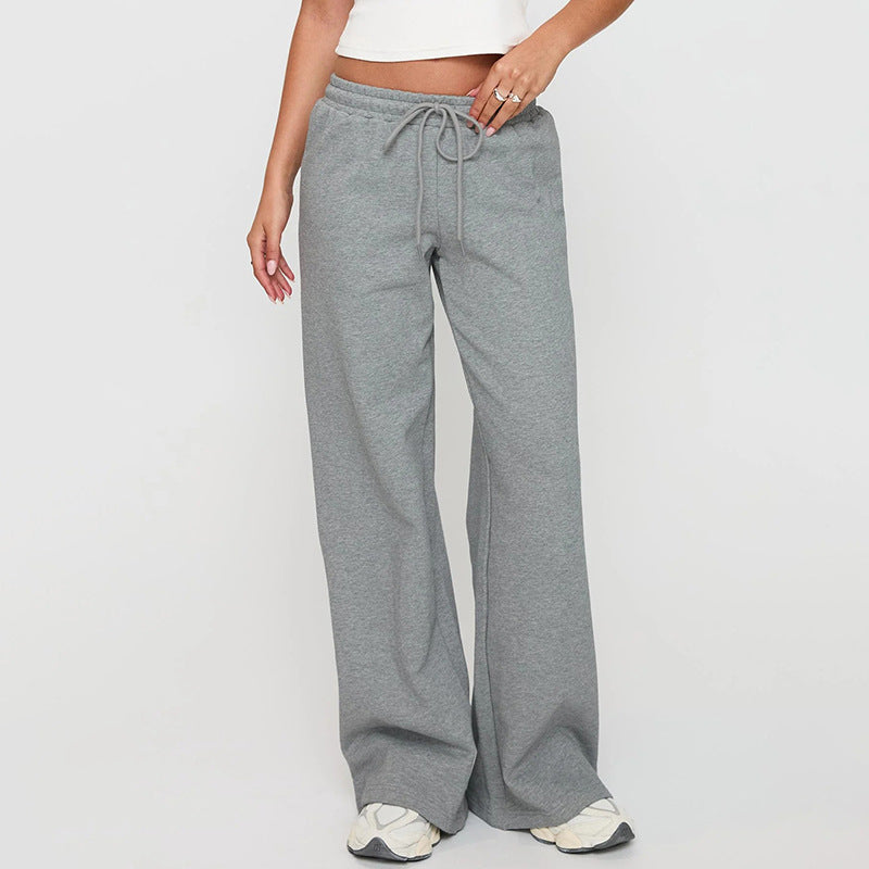 Women’s casual loose-fit trousers by Bella Mia featuring a drawstring waist and solid color, perfect for autumn wear.
