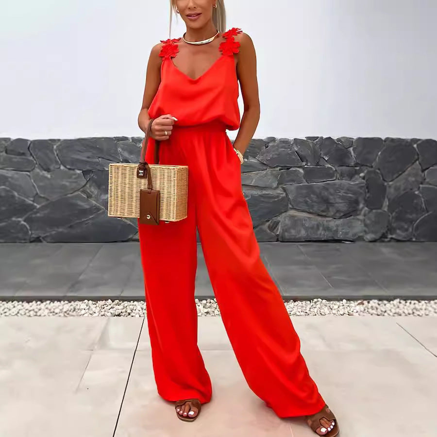 Casual sleeveless jumpsuit for women with suspenders and pockets, loose fit ideal for spring and summer wear by Plush Fashion Hub.