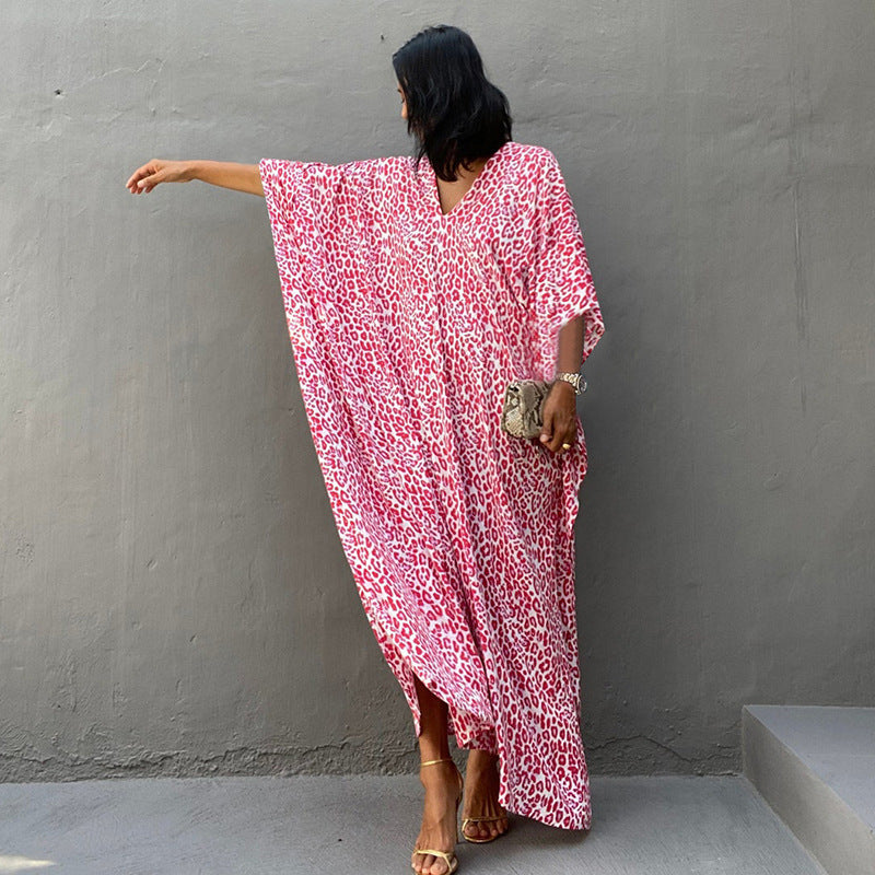 Printed long beach cover-up skirt by Plush Fashion Hub, featuring sun protection and flowy maxi dress style for vacation wear.