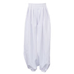 Women’s white high-waist tapered trousers with pleats, loose fit, and casual style from Wanita Store featuring all-match design.