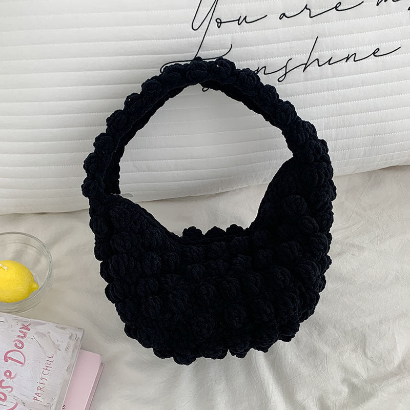 Handmade crocheted solid color beanie straw bag by Bella Mia, woven hand-carry seaside vacation beach bag for women.