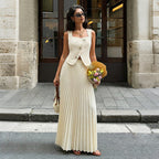 Elegant summer pleated skirt two-piece set for women by Bella Mia, featuring a flowy skirt and matching top in a stylish design.