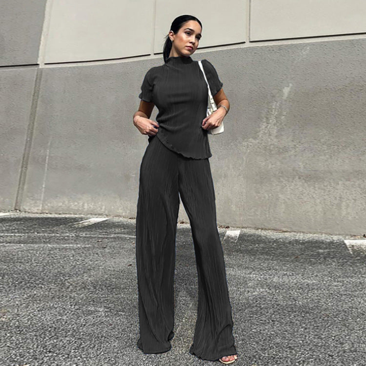 Blue pleated high-waist wide-leg pants with a casual spring slimming T-shirt, styled for women’s fashion from Wanita Store.