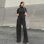 Blue pleated high-waist wide-leg pants with a casual spring slimming T-shirt, styled for women’s fashion from Wanita Store.