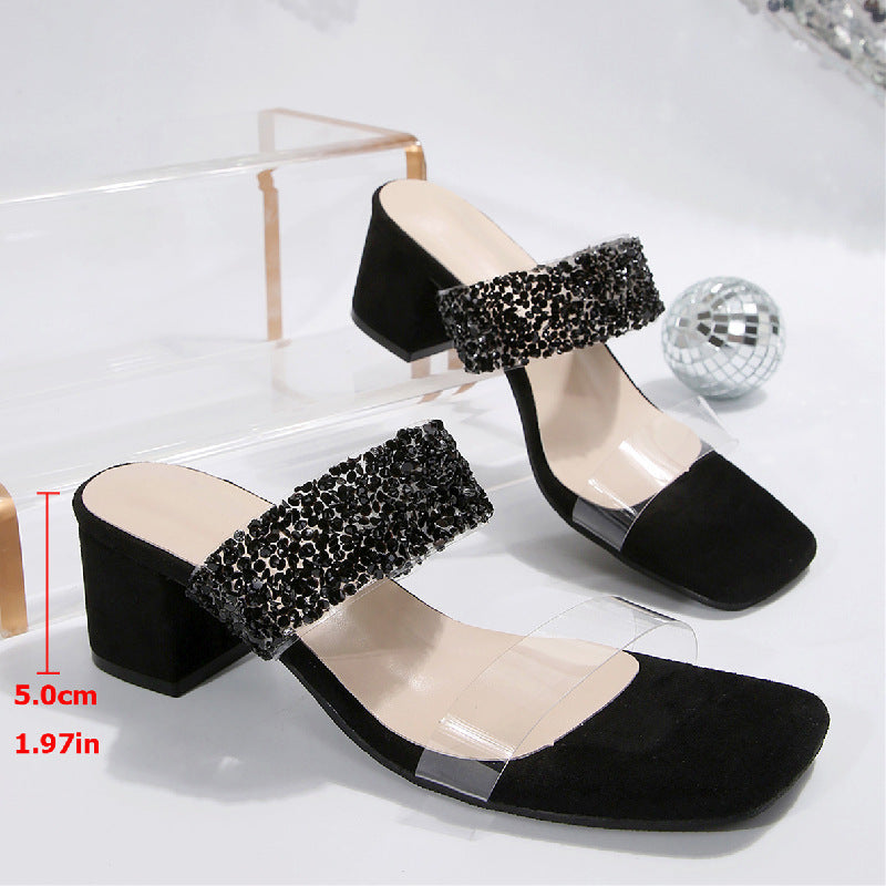Bella Mia women's one-strap mid heel slippers with chunky square toe and rhinestone embellishments on stylish sandal heels.