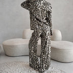 Bella Mia women's satin leopard print pajamas with long sleeves and trousers, featuring a soft, comfortable homewear design.