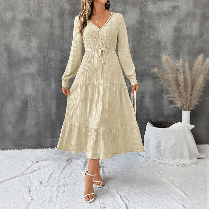 Elegant Bella Mia long sleeve pleated V-neck dress in solid autumn color, featuring a stylish and sophisticated design.