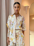Casual women's two-piece spring summer suit with pocketed half sleeves and loose fit, suitable for everyday wear.