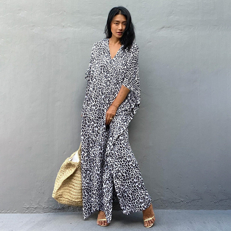 Printed long beach cover-up skirt by Plush Fashion Hub, featuring a maxi dress style with sun protection and stylish blouse design.