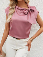 Bella Mia satin women's T-shirt with half open collar and bow detail, featuring a special interest design.