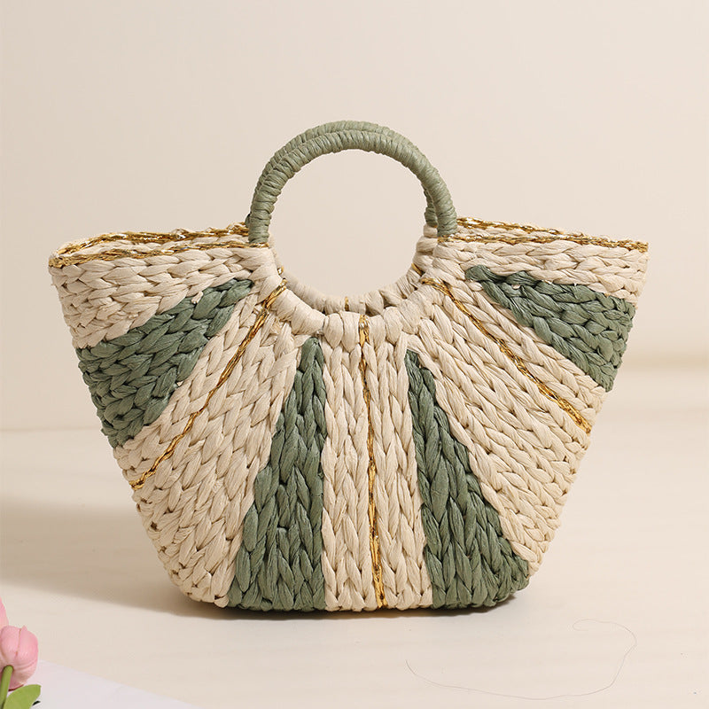Bella Mia large straw-weaved tote bag with contrast color handles, perfect for beach, vacation, or vegetable shopping.