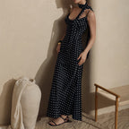 Plush Fashion Hub strap maxi dress with halter neck, fishtail silhouette, and polka dot pattern for summer wear.