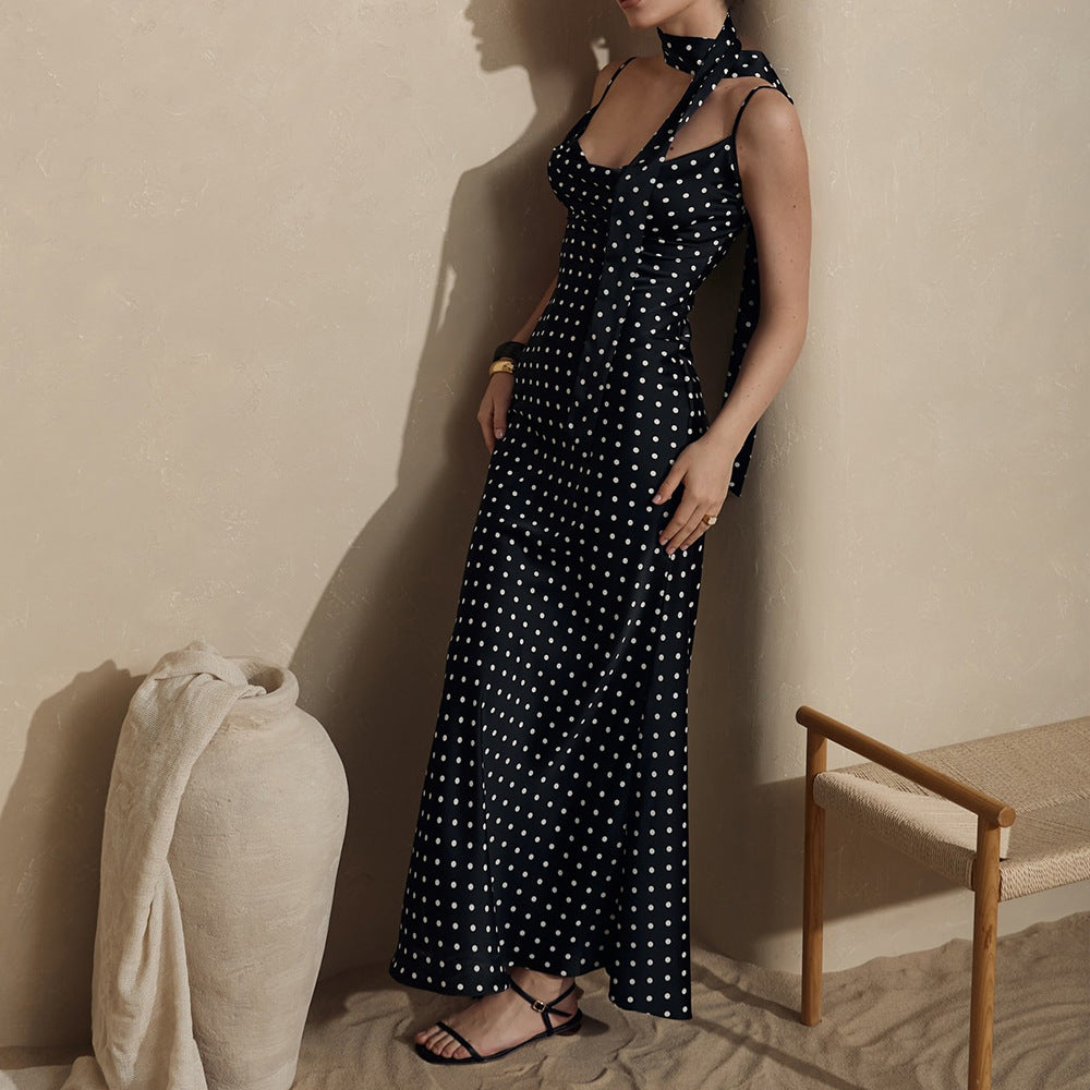 Plush Fashion Hub strap maxi dress with halter neck, fishtail silhouette, and polka dot pattern for summer wear.
