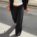 Women’s casual loose fit trousers by Bella Mia, solid color with drawstring waist, perfect for autumn casual wear.