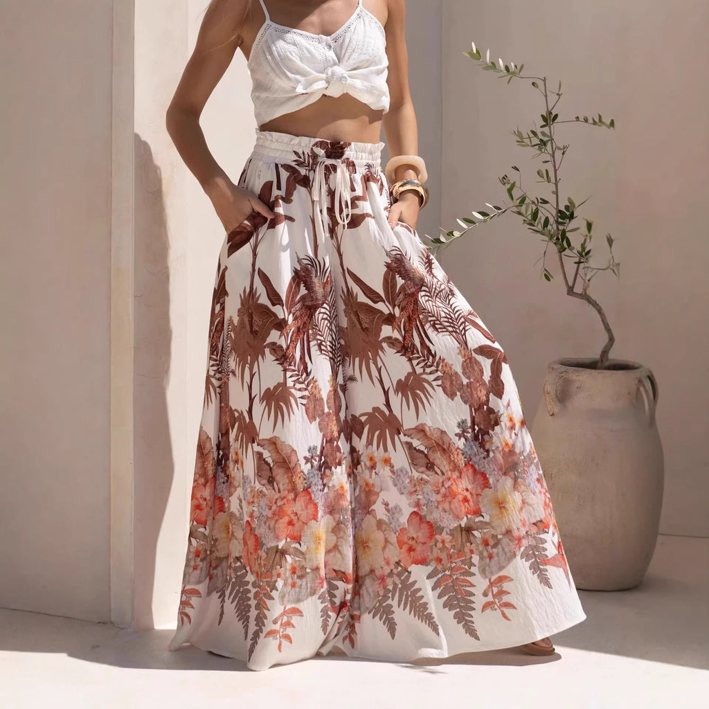 Leaf print summer wide-leg pants from Wanita Store featuring casual, loose-fitting design and comfortable wide leg style.
