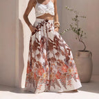 Leaf print summer wide-leg pants from Wanita Store featuring casual, loose-fitting design and comfortable wide leg style.