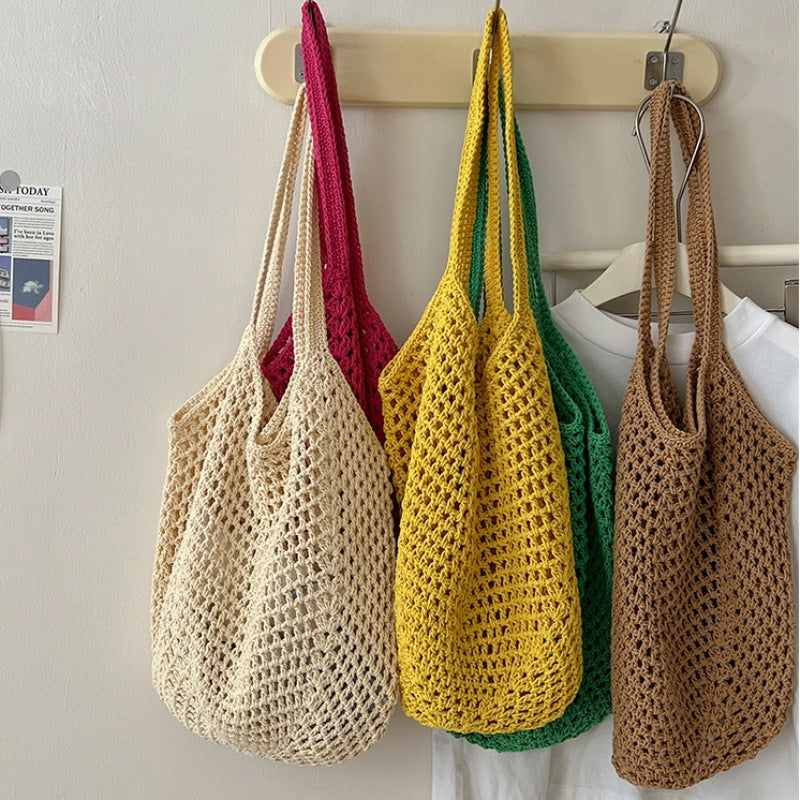 Casual large cotton woven straw shoulder bag with cutout design, ideal for beach or vacation, by Plush Fashion Hub