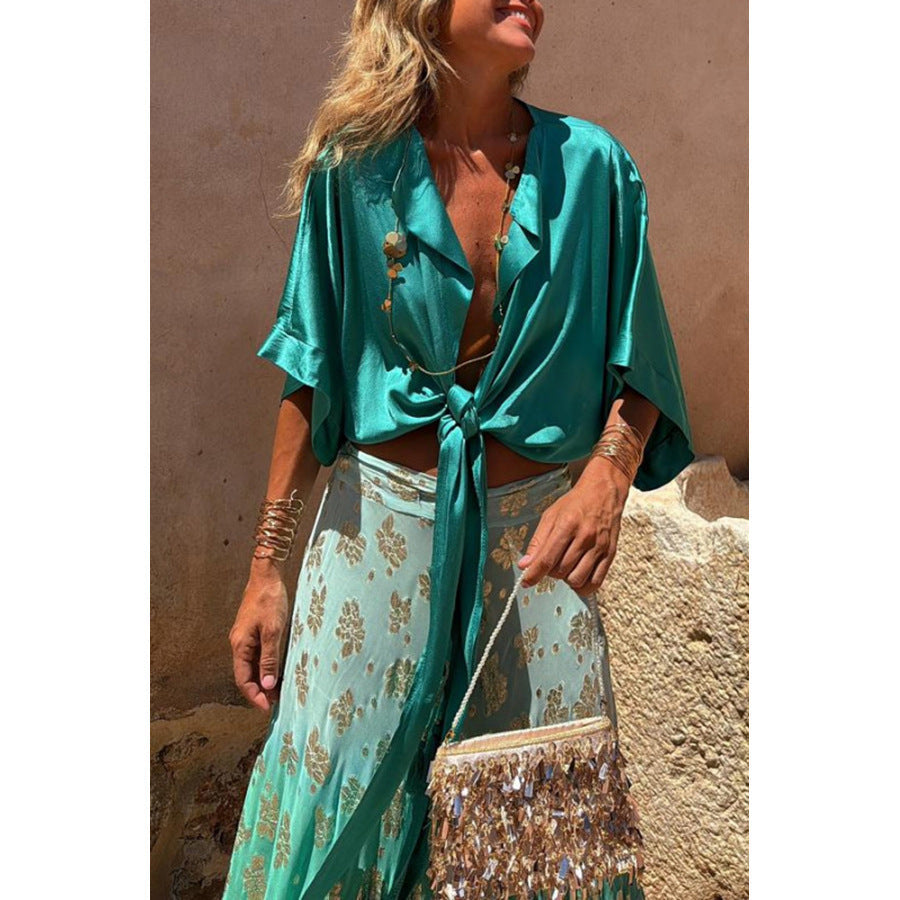 Colorful multi-color lace-up women's top with casual loose fit and batwing sleeves, perfect for spring and summer vacations.