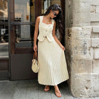 Elegant Bella Mia summer pleated skirt two-piece set for women, featuring a flowing skirt and matching top.