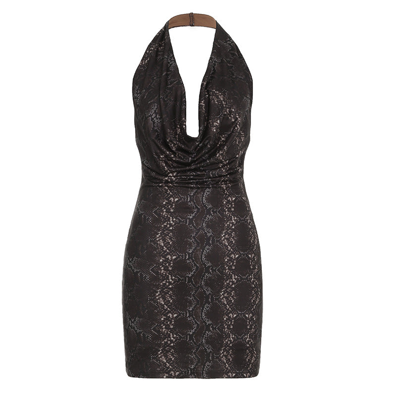 Metallic glossy sleeveless halter dress by Bella Mia with swing collar, backless design, and sheath fit for a sexy look.