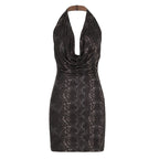 Metallic glossy sleeveless halter dress by Bella Mia with swing collar, backless design, and sheath fit for a sexy look.