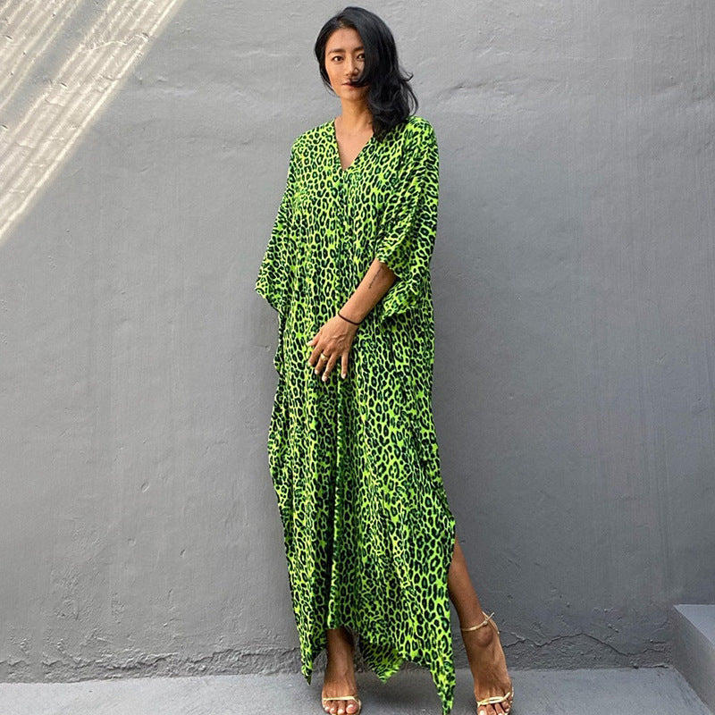 Printed long beach cover-up skirt from Plush Fashion Hub, featuring a maxi dress style with sun protection and swimsuit-friendly design.