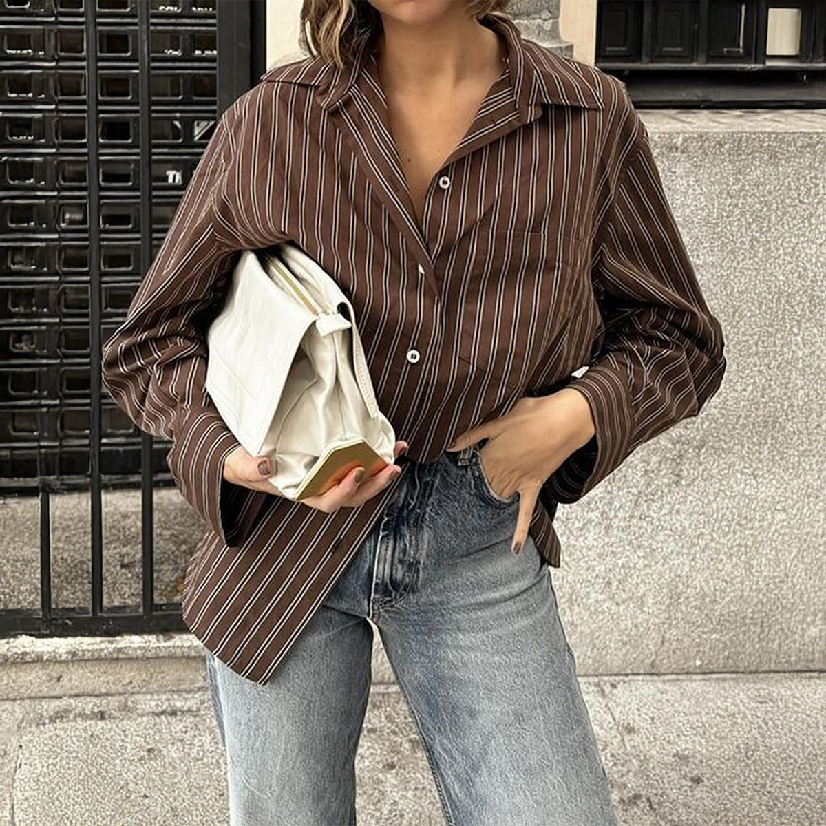Women’s plaid long sleeve coat shirt by Plush Fashion Hub, perfect for autumn casual vacation style, shown in natural fabric detail.