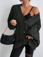 Women’s V-neck retro knit sweater by Bella Mia featuring loose fit, twist design, lantern sleeves, and cardigan style.