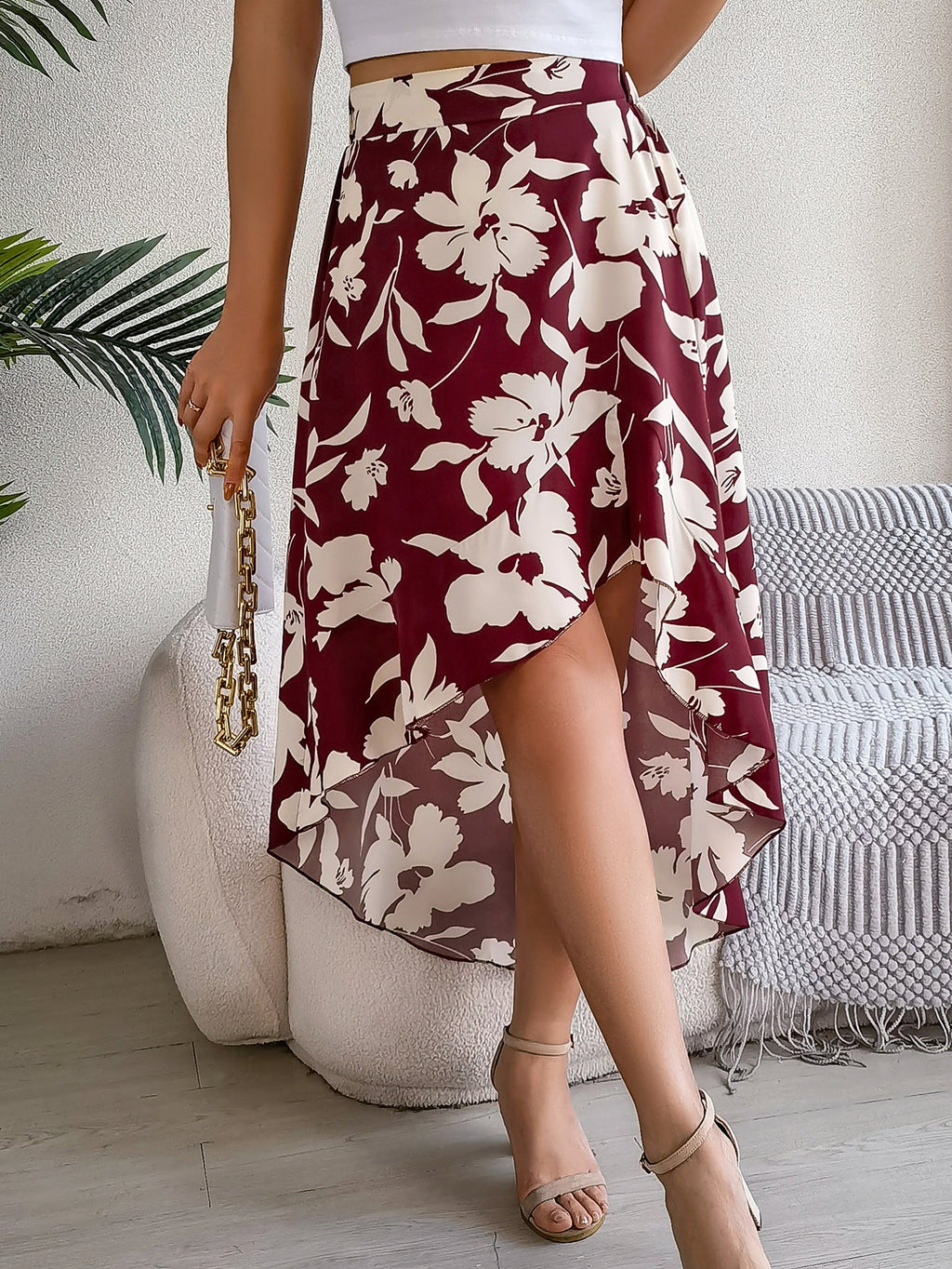 Elegant floral ruffled asymmetric skirt for women, perfect for spring and summer, with mid-length and irregular design.