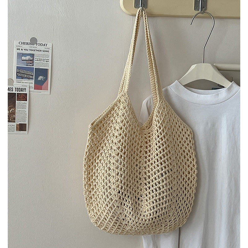 Large cotton woven straw bag with cutout design, shoulder strap, perfect for beach or vacation, by Wanita Store.