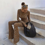 Spring women's leopard print jumpsuit with round neck, high waist, long sleeves, and backless design by Plush Fashion Hub.