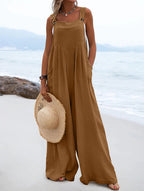 Women’s summer jumpsuit by Bella Mia featuring ethnic design, solid color, wide-leg style, perfect for warm weather wear.