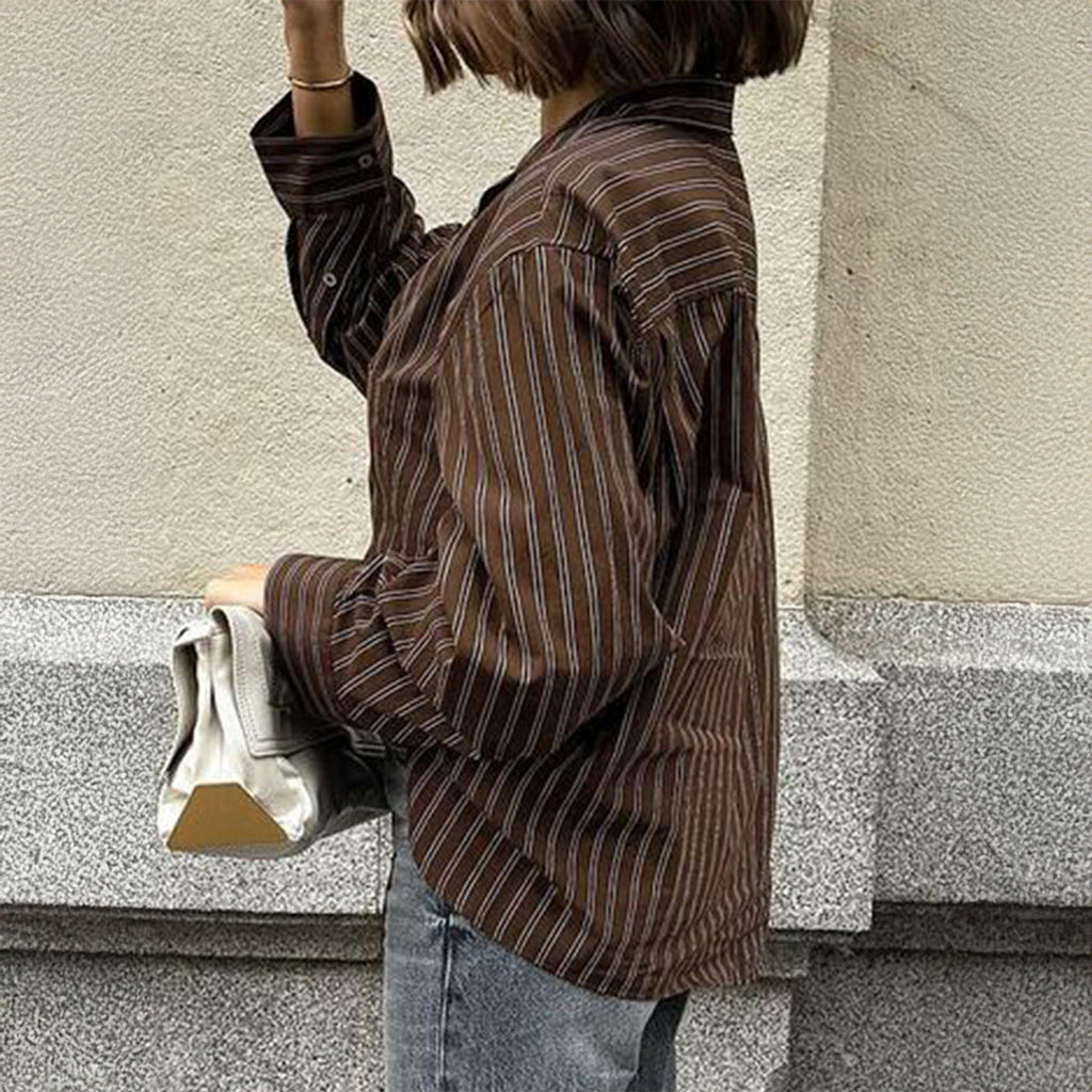 Women’s plaid long sleeve coat shirt from Wanita Store, perfect for autumn casual vacation wear, shown in a relaxed fit style.