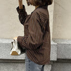 Women’s plaid long sleeve coat shirt from Wanita Store, perfect for autumn casual vacation wear, shown in a relaxed fit style.