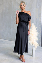 Summer cocktail dress by Plush Fashion Hub featuring a sloping shoulder, off-the-shoulder style, and a tied solid color design.