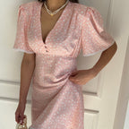 Women’s summer floral dress by Plush Fashion Hub featuring a V-neck, short sleeves, and high waist in a casual short style