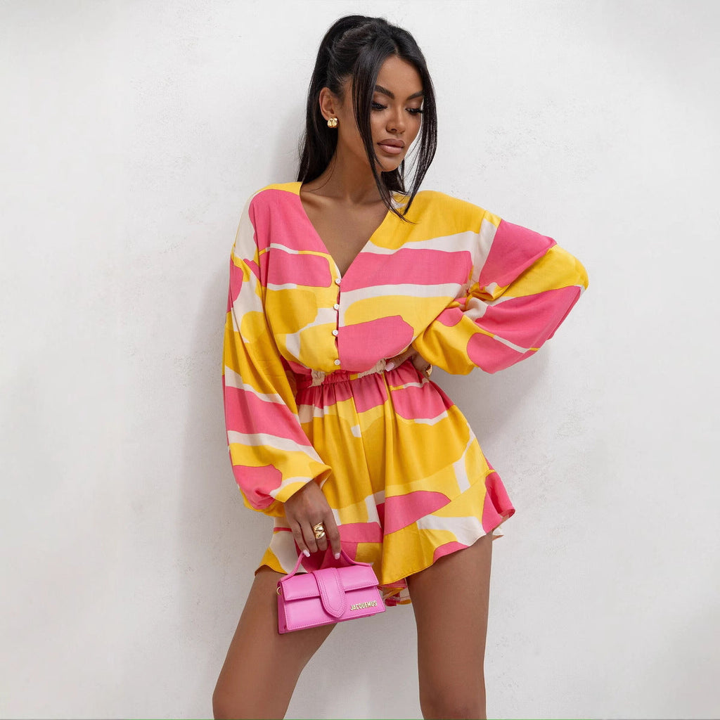 Bella Mia women's summer jumpsuit with V-neck, printed long sleeves, ruffles, waist trimming, and shorts for a stylish look.