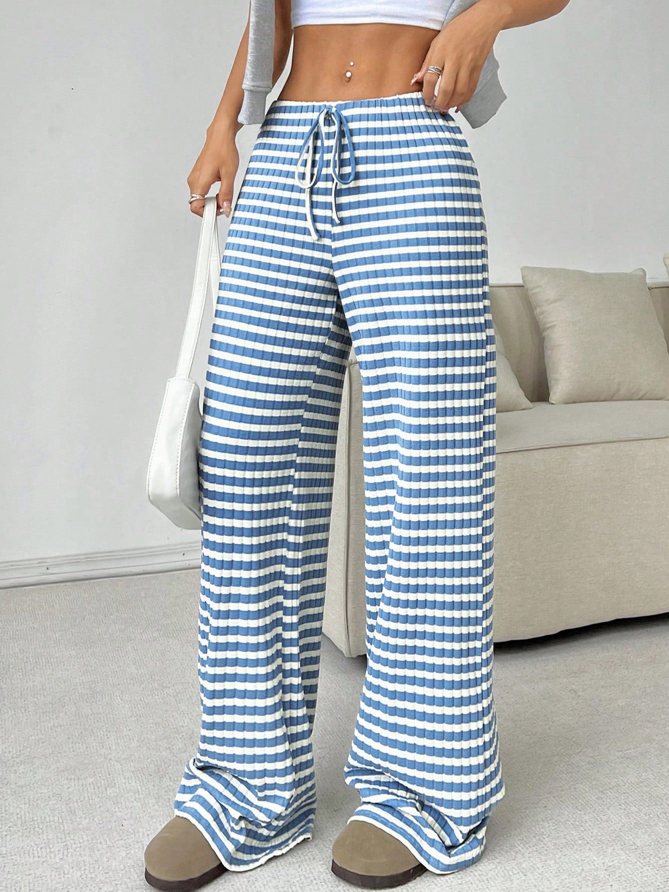 Women’s casual striped straight-leg pants with rubber band and drawstring, in solid colors for autumn and winter.
