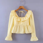 Summer Wind Bella Mia women's long sleeve ruffled shirt in solid color, featuring a stylish design and lightweight fabric.