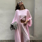 Three-piece summer pajamas set by Bella Mia with a knitted solid color top and loose trousers for comfortable home wear.